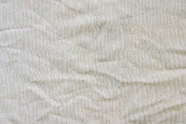 Buruşmuş beyaz keten kumaş. Duvar kağıdı tasarımı için pamuk..