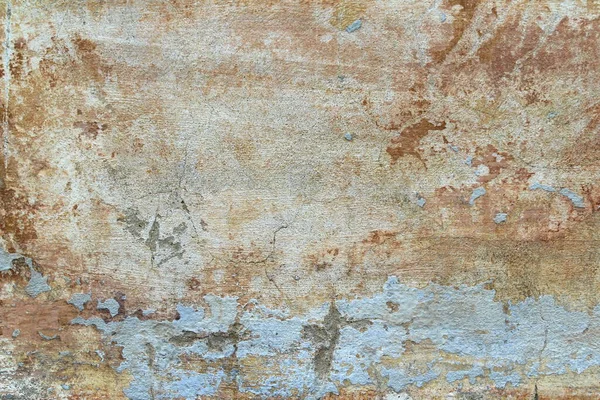 Antigua pared agrietada cubierta con estuco con manchas abstractas de pintura azul, rosa y ébano — Foto de Stock