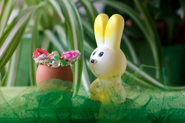 Easter celebration concept. toy bunny and decorated easter egg on grass. happy easter and spring — Stock Photo, Image