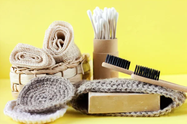 Natural self care products. eco friendly bathroom and spa accessories. Zero waste concept. bamboo toothbrush, washcloth, soap saver, natural soap.