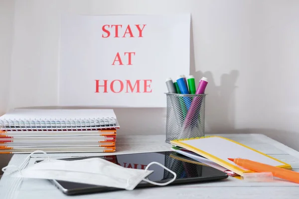 Stay Home Concept Tablet Medical Mask Books Markers Wooden Table — Stock Photo, Image