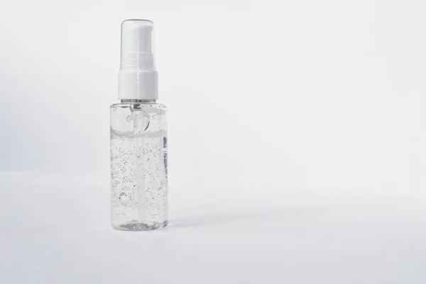 Anti age serum in glass bottle with pump. Facial gel serum with collagen peptides. — Stock Photo, Image