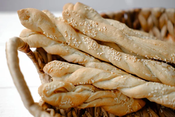 Italian Grissini Salted Breadsticks Sesame Breadsticks Craft Paper White Wooden — Stock Photo, Image