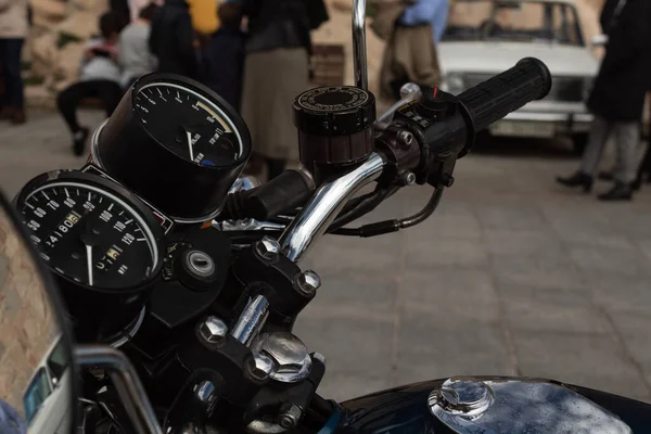 Motorcycle dashboard close up, outdoors