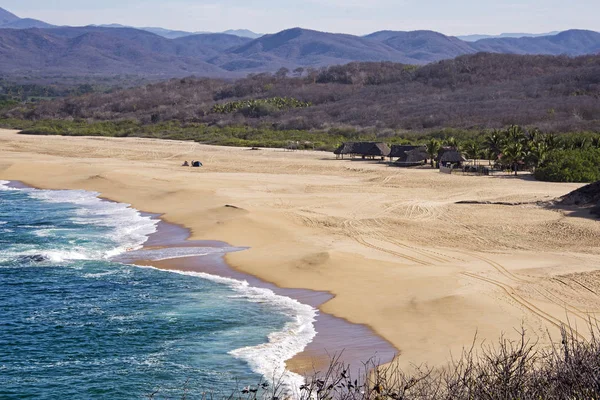 Areia e surf no Oceano Pacífico — Fotografia de Stock