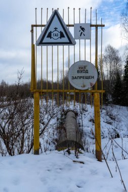 Gas pipe Nord Stream with prohibition signs in Russian. Translation of Russian inscriptions: Gas. Gas entry is prohibited.