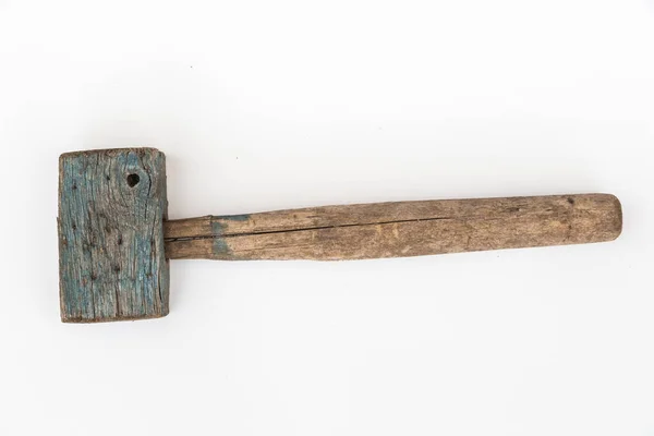 Old wooden mallet on a white background