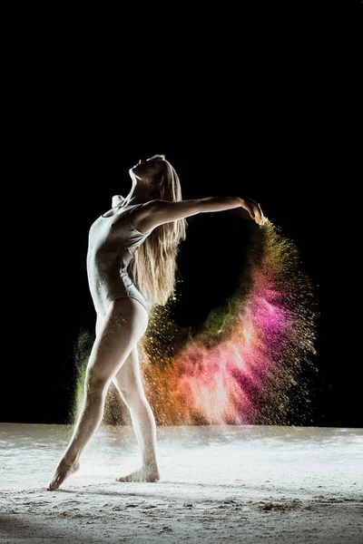 Bailarina arco iris aislada sobre fondo negro —  Fotos de Stock