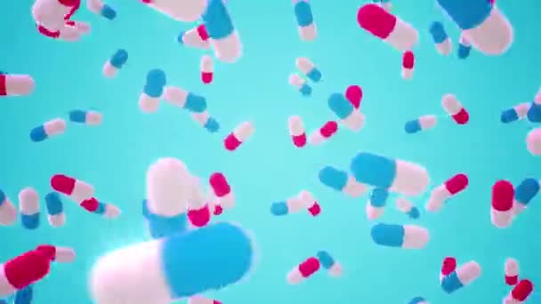 Rotating Pink Blue Pills Cyan Backdrop Seamlessly Looping Animated Background — Stok video