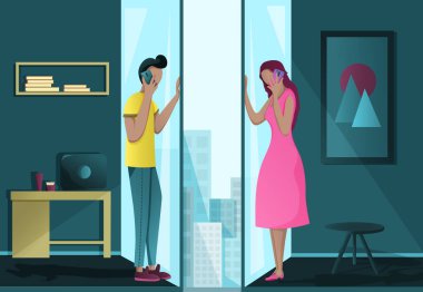 Akıllı telefonları olan kız ve erkek birbirlerine bakıyorlar..