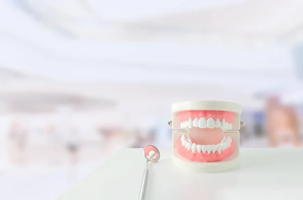 Close White Teeth Model Red Gum Dental Mirror Blur Background — Stock Photo, Image