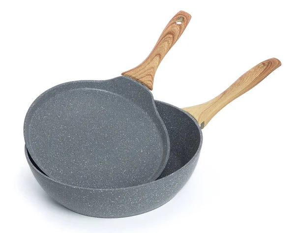 Two cast-iron frying pans with a wooden handle without a lid, on — Stock Photo, Image