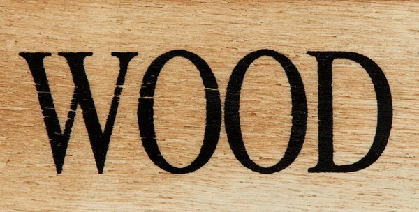 Houten plank met inscriptie — Stockfoto