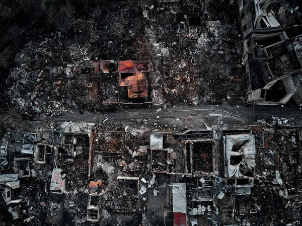 Old home after fire and burned everything in the area.