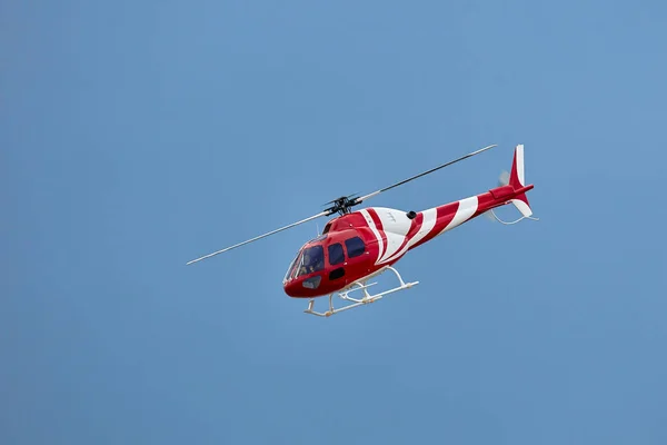 Radio controlled model helicopter in flight