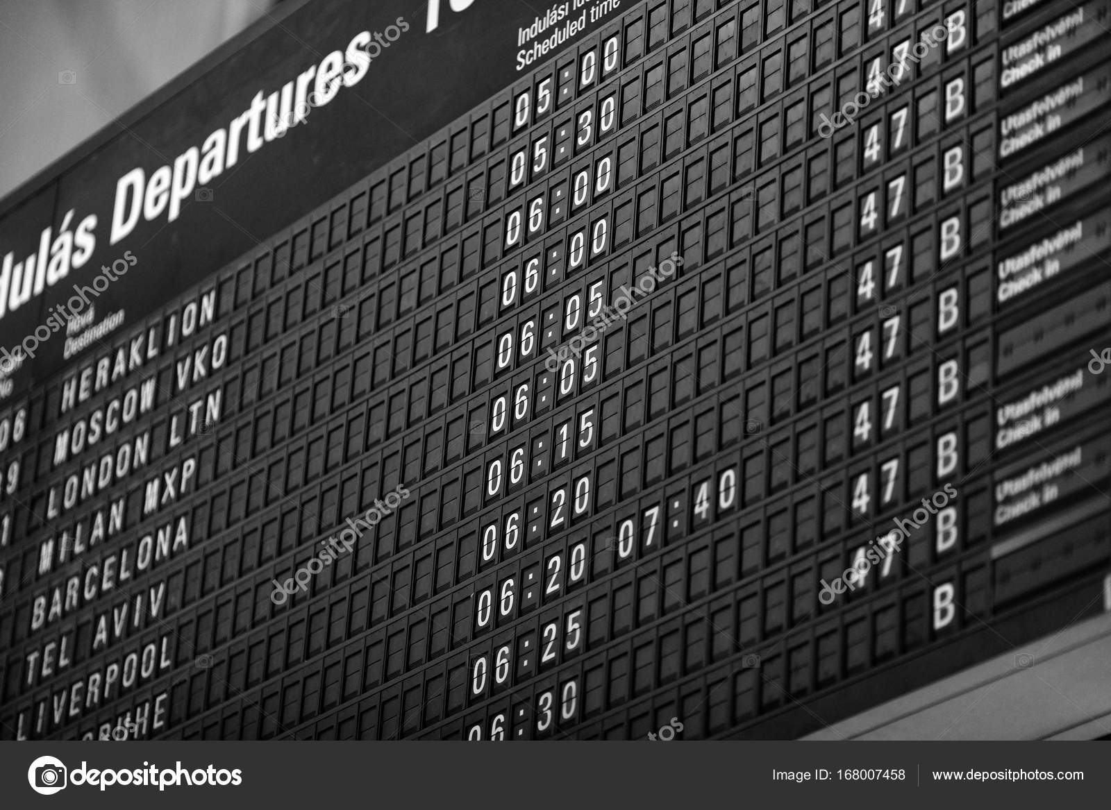 Time boards at the airport. Flight information mechanical timetable