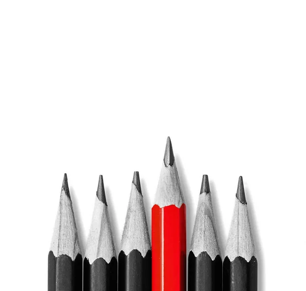 Be like everyone else. stand out from the crowd. pencils on white, One red pencil standing out from the row of black pencils. — Stock Photo, Image