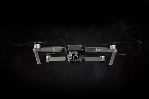 DJI Mavic Pro drone - Flying in the dark, on black background. C — Stock Photo, Image
