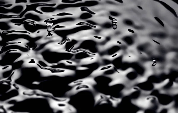 Mouvement de l'eau - Résumé Texture liquide de fond noir. extraction liquide — Photo
