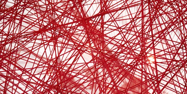 Red thread. Abstract red lines.