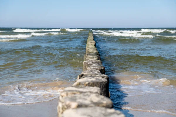 View to the Baltic Sea with its groynes at the beach of Zempin. — Stock Photo, Image