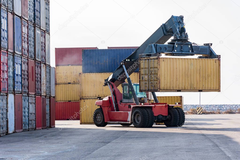Crane in the port moving containers