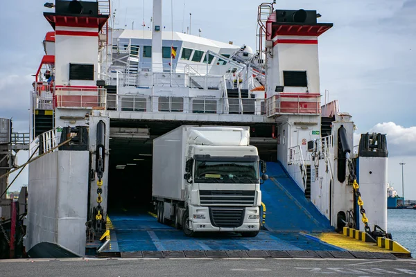 Refrigerated truck embarking on a ferry