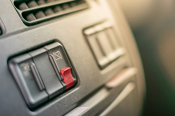 Circuit breaker switch inside the cab of a truck, mandatory for dangerous goods.