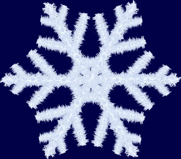 Снежинка на синем фоне — стоковое фото