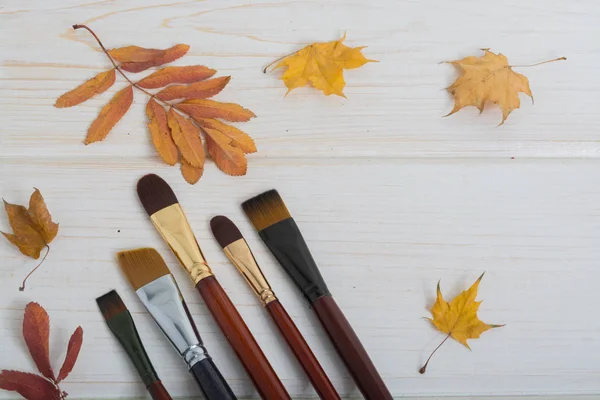 brushes for make up (drawing) decorate autumn leaves