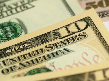 Renkli bir geçmişi ve farklı değerlerde paraları var. Bankaların finansmanı ile ilgili en iyi iş görüşü. Amerikan banknotları 5, 10, 50, 100 dolar fon