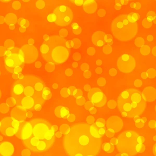 Bokeh seamless shinning background with yellow points in different sizes irregularly scattered on vibrant orange background — Stock Photo, Image