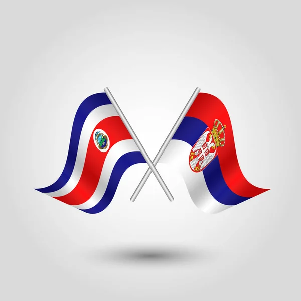 Vetor duas bandeiras cruzadas ricas e sérvias em varas de prata - símbolo da costa rica e sérbia —  Vetores de Stock