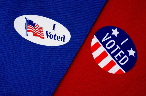 "I Voted" Voter Sticker Given At The Election Polls, on Red and Blue Background — Stockfoto