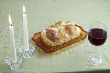 Shabbat Candles,Challah, And Glass Of Wine clipart