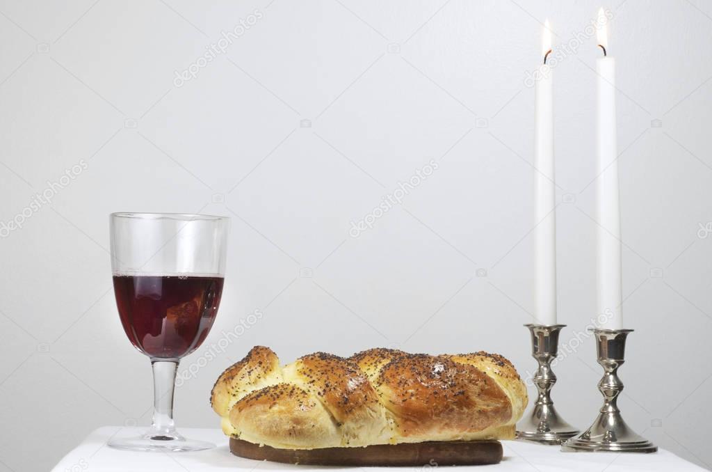 Shabbat Candles,Challah, And Glass Of Wine