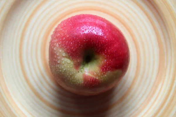 Red apple on a dish