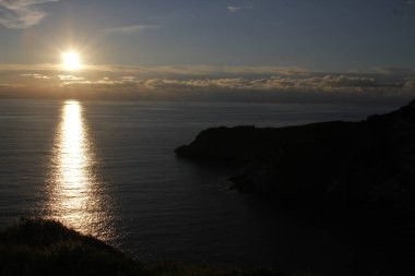 Bir yaz gününde, gün batımında