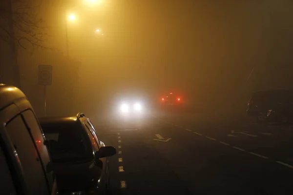 Fog in a road at night