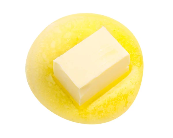 Melted butter piece floating, top view — Stock Photo, Image