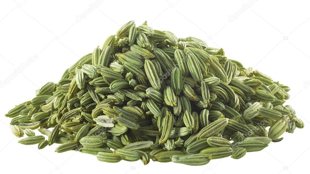 Pile of dried fennel seeds (Foeniculum vulgare fruits), isolated
