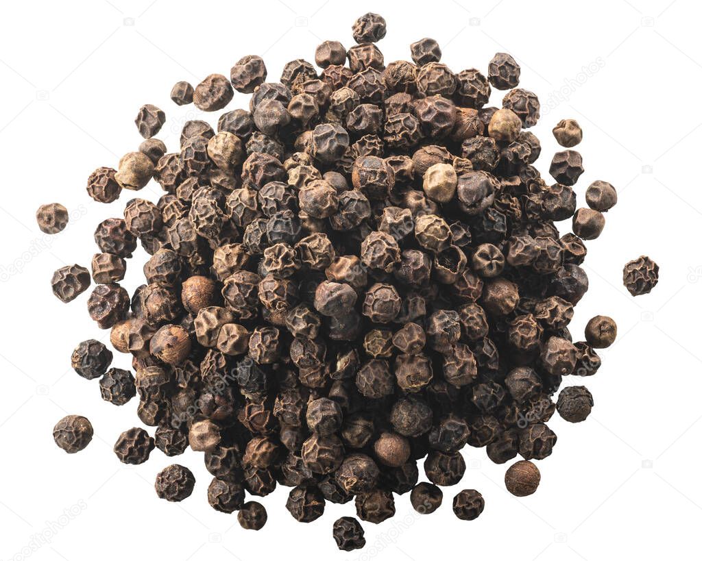 Pile of black peppercorns, a dried fermented seeds of Piper nigrum, isolated, top view