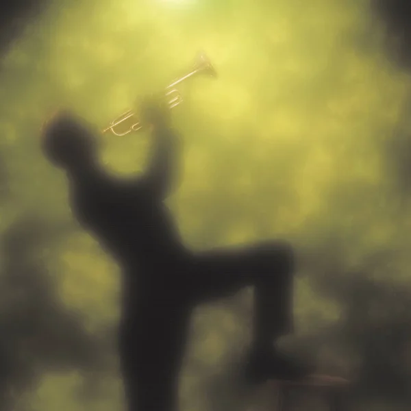 A stylized shot of a man playing the trumpet, perhaps playing jazz, in celebration.