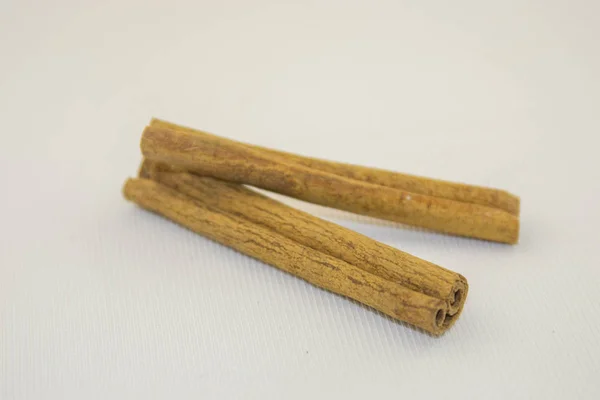 Cinnamon sticks on a white background — Stock Photo, Image