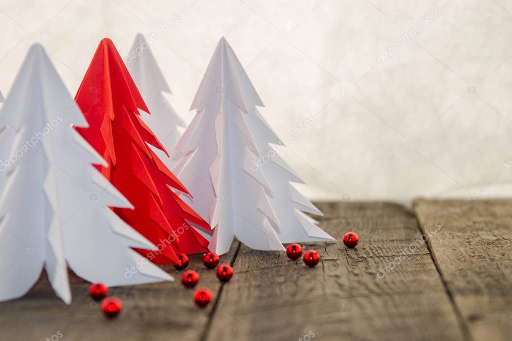White  and red origami Christmas tree with red decoration