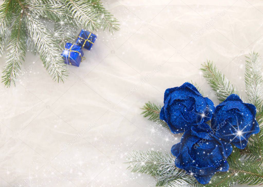 Blue glitter decoration for Christmas tree, branches of Christmas tree and bright stars on a white background