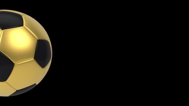 Realistische zwarte en gouden voetbal bal geïsoleerd op zwarte achtergrond. 3d looping animatie. — Stockvideo