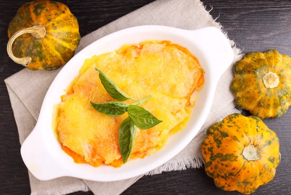 Gratin potatoes and pumpkins with milk. — Stock Photo, Image