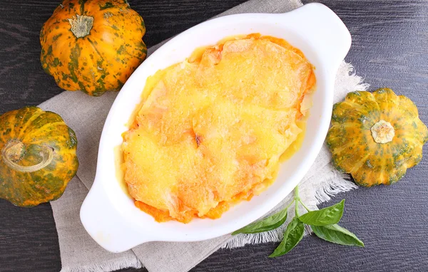 Gratin potatoes and pumpkins with milk. — Stock Photo, Image