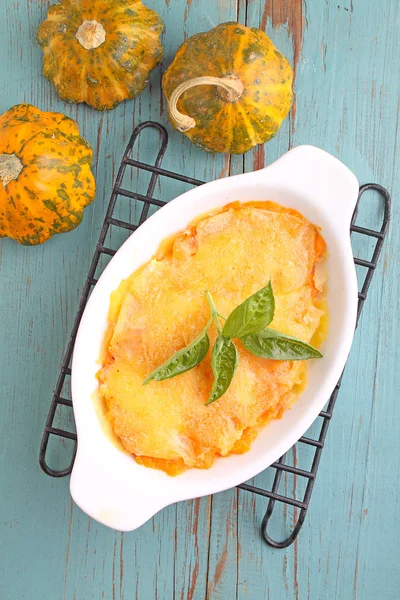 Gratin potatoes and pumpkins with milk. — Stock Photo, Image